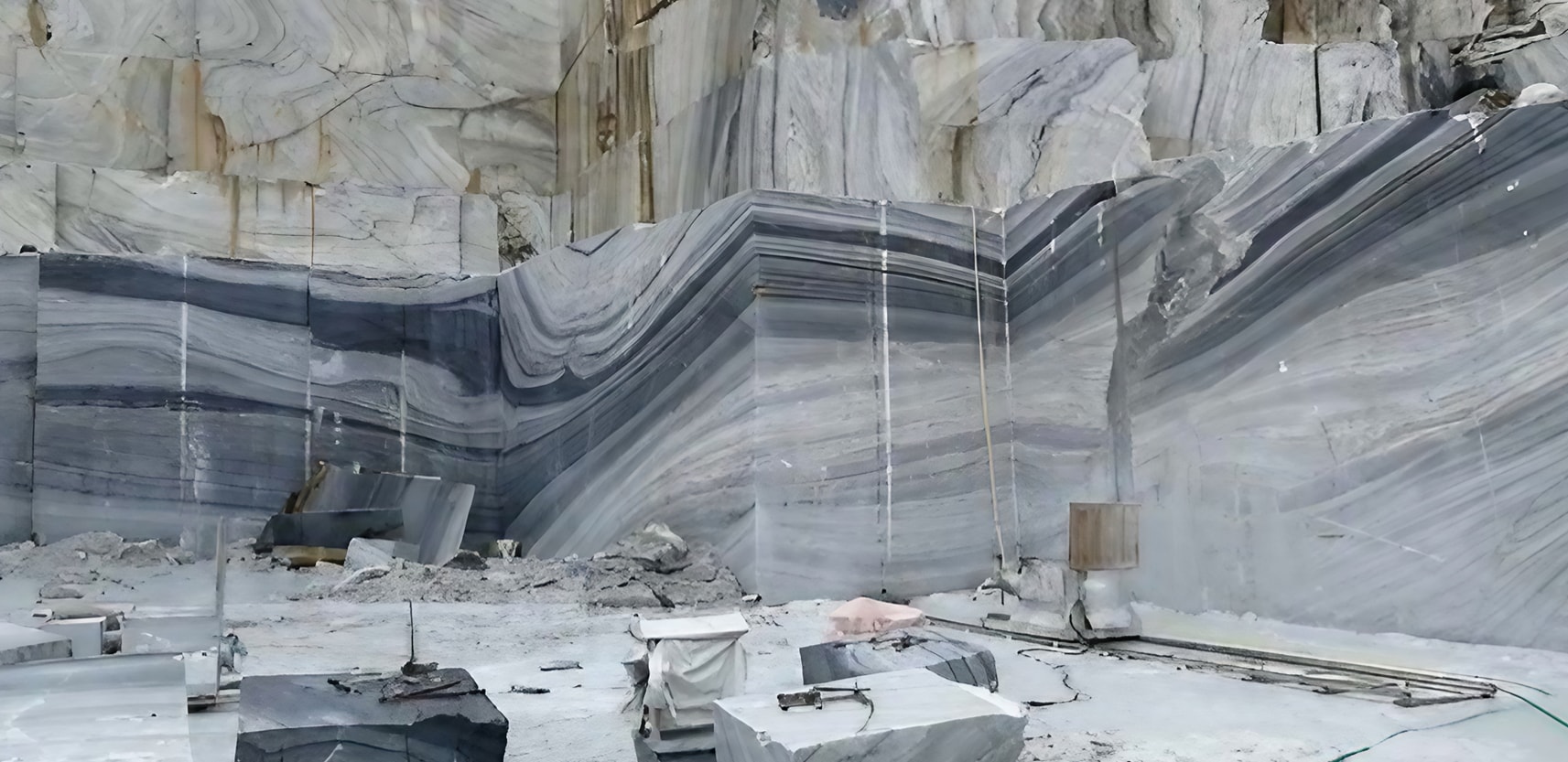 Marble Quarry Perspectives: Capturing Nature'S Artistry 9 The Blue Danube Marble Quarry, situated in Jiangsu China, is renowned for its exquisite Blue Danube Marble. This marble boasts a captivating blue-gray color with distinct veining, reminiscent of flowing water. The quarry's blend of ancient techniques and modern precision allows skilled artisans to extract and transform the marble into elegant slabs that showcase its natural beauty. Blue Danube Marble finds application in diverse areas, from architecture to interior design, adding depth and sophistication. A visit to the quarry offers a chance to witness the harmony of nature and human creativity, as each marble slab embodies the surroundings and craftsmanship. The quarry stands as a testament to the enduring connection between Earth's treasures and artistic innovation, capturing the allure of blue-gray hues and the artistry that shapes them into enduring works of elegance.