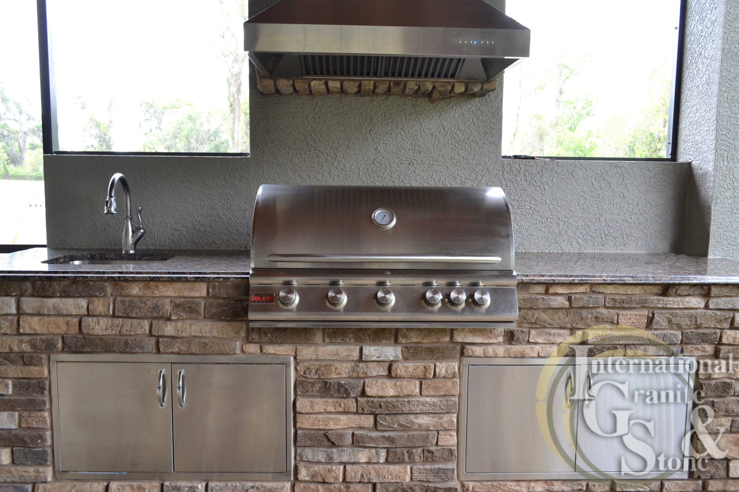 Granite Outdoor Kitchen Countertop Installation In Lakeland Fl 2 Baltic Brown Granite Outdoor Kitchen Countertop with Blaze Grill and Fake Brick Fascia