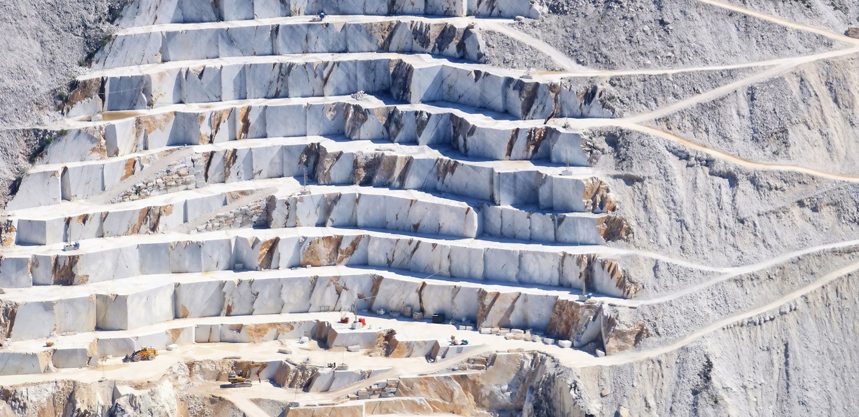 Marble Quarry Perspectives: Capturing Nature'S Artistry 4 The Calacatta Marble Quarries in Italy's Apuan Alps embody the convergence of natural beauty and artistic expression. Renowned for producing luxurious Calacatta marble, these quarries showcase its distinctive appearance and rarity. Amidst the towering peaks, skilled extraction reveals a canvas of geological art, each slab telling a story spanning millennia. The marble serves as inspiration for architectural masterpieces and artworks worldwide. A blend of tradition and innovation, these quarries echo with nature's beauty and human dedication, symbolizing opulence and taste. They celebrate the intricate interplay between Earth's treasures and human creativity, encapsulating elegance and enduring artistic connection.