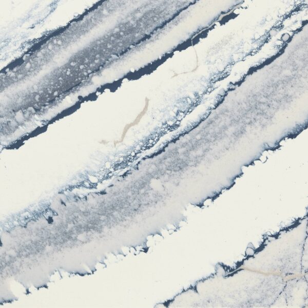 Close-up view of Cambria Inverness Bristol Bay Quartz countertop featuring stormy-blue waves, cool white backdrop, and debossed Inverness veins, showcasing its high gloss finish and durability for residential and commercial applications.